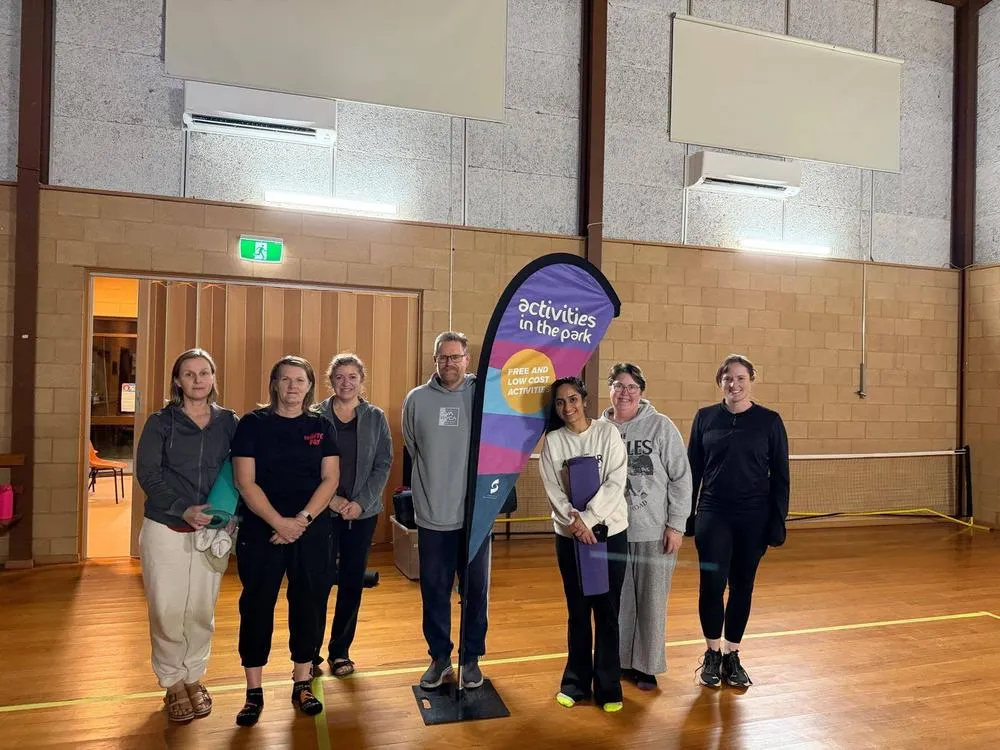 Smiling faces after a community yin class